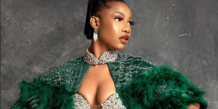 Tacha of BBNaija looks stunning at the Future Awards in an open-chest green outfit