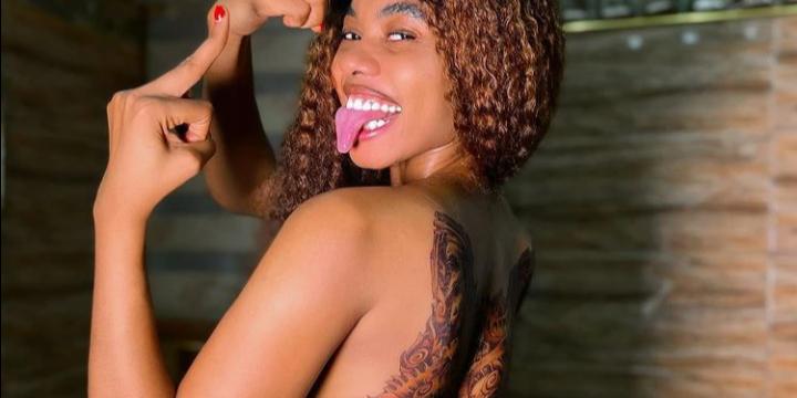 Popular Nigerian dancer Jane Mena show off new tattoo