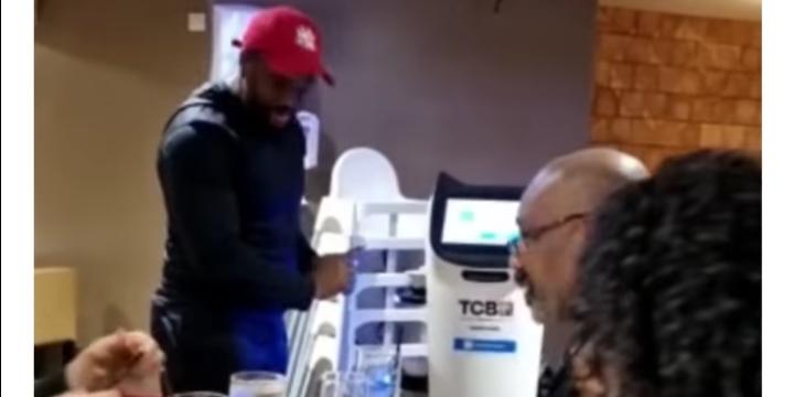 'They don't take tips,' says the narrator At a restaurant, Williams Uchemba has a funny experience with a robot serving him food